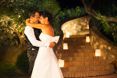 intimate first dance of an italian bride and groom smiling on their first dance at night in villa margherita cesena italy