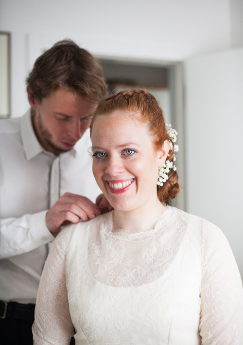 red hair bride smiling during her bridal preparation in italy trento