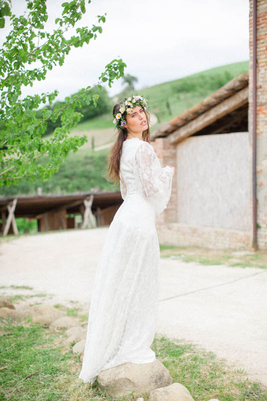 fine art portrait of an italian bride with a floral crown in a rustic and organic style