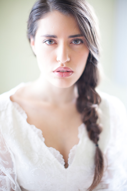 fine art close up portrait of an italian bride with a bride in a very soft and romantic light