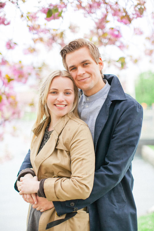 romantic portrait of a norwegian blonde couple hugging and smiling in bergen norway